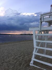 View of calm sea against cloudy sky