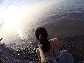 Rear view of woman on beach
