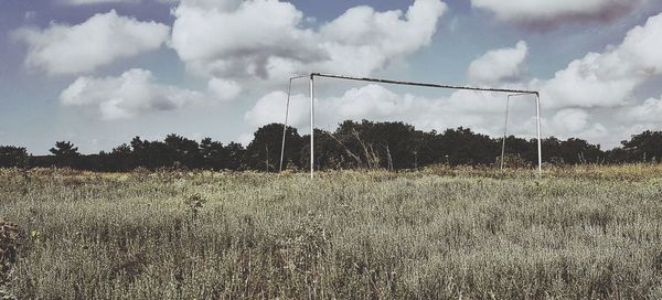 Panoramic view of field against sky