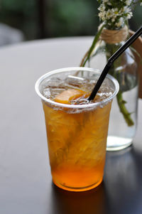 Close-up of beer glass on table