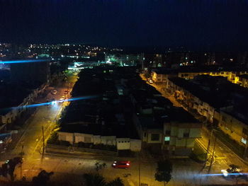 High angle view of road in city at night