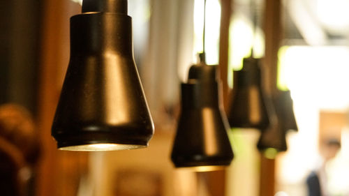 Close-up of wine bottles on table