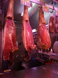 Low section of people at market stall