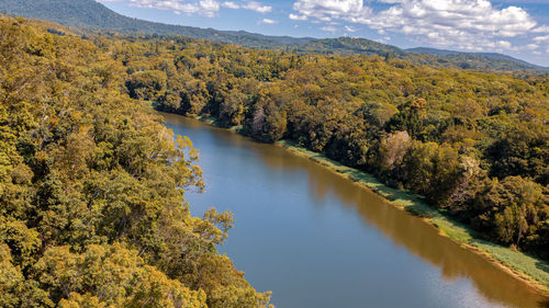 Scenic view of lake amidst trees during autumn