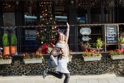 Portrait of mother with christmas tree