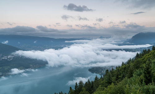 Scenic view of mountains against sky at sunset