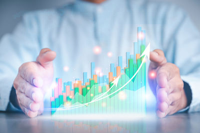 Close-up of hand holding mobile phone