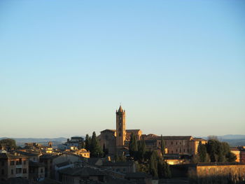 Cityscape against blue sky