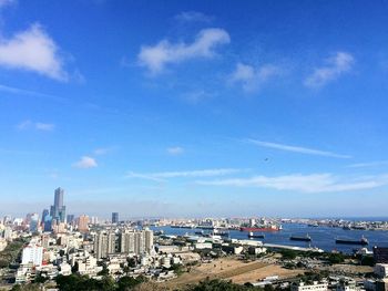 Cityscape against blue sky