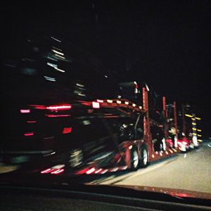 Light trails on road at night