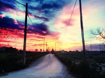 Empty road at sunset