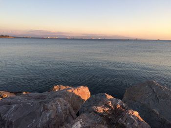 Scenic view of sea at sunset