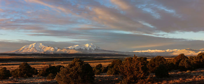 Scenic view of landscape against sky during sunset