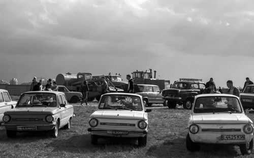 Cars on road against sky