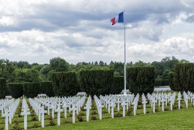 Scenic view of cemetery against sky