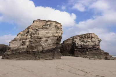 View of rock formations on beach