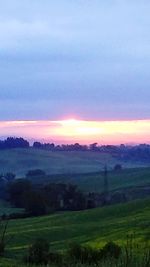 Scenic view of landscape against sky during sunset