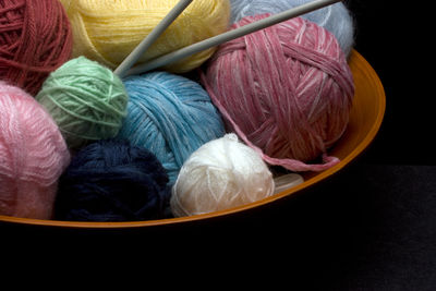 Close-up of wool in container