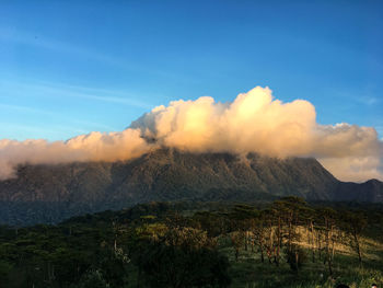 Scenic view of volcanic mountain against sky