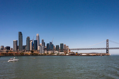View of suspension bridge over sea