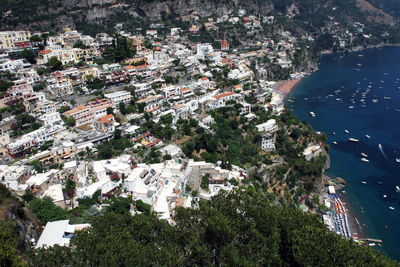 High angle view of town by sea