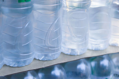 Close-up of glass bottles on table