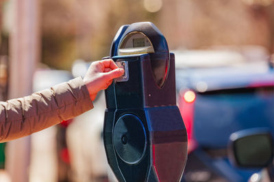 Close-up of hand holding camera