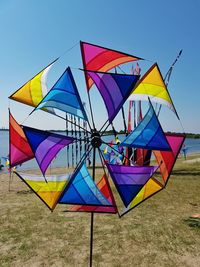 Close-up of colorful umbrella against clear sky