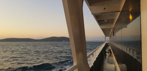 Scenic view of sea against clear sky during sunset