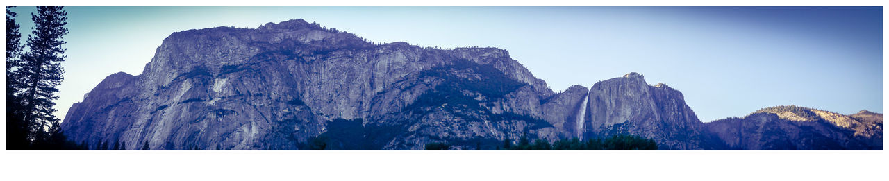 Scenic view of mountains against clear sky