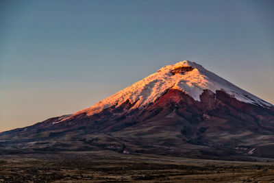 Scenic view of mountains against clear blue sky