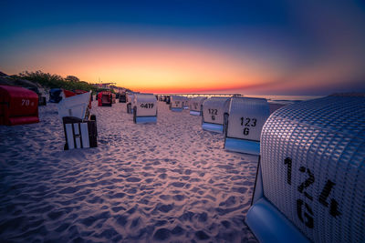 Panoramic view of beach against sky during sunset