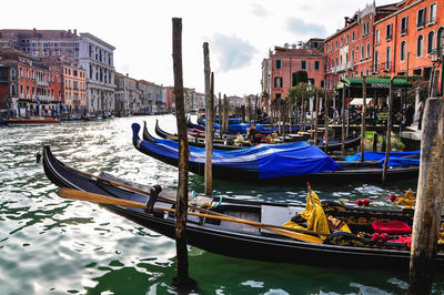 Boats moored in city