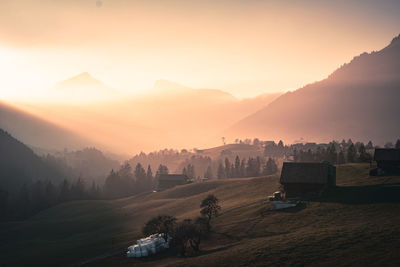 Scenic view of landscape against sky during sunset