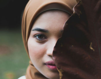 Close-up portrait of young woman