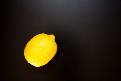 Close-up of apple against black background