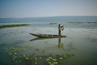 View of boats in calm lake