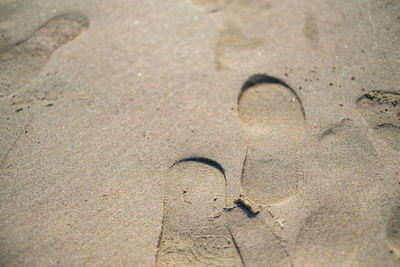 High angle view of text on beach