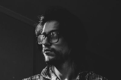 Portrait of young man looking away