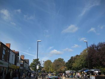 City street against cloudy sky