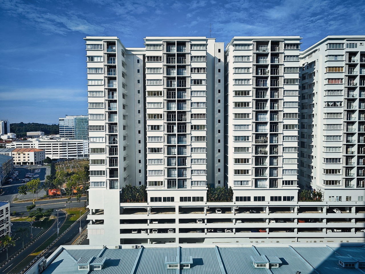 architecture, building exterior, tower block, built structure, city, building, metropolitan area, residential area, condominium, metropolis, skyscraper, residential district, cityscape, sky, urban area, office building exterior, apartment, no people, nature, downtown, neighbourhood, office, day, city life, outdoors, landmark, facade, skyline, street, headquarters, blue, window, construction industry, business finance and industry