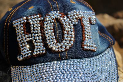 Close-up of hot text on cap