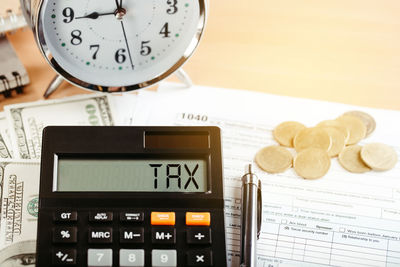 Close-up of clock on table