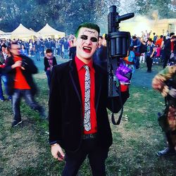 Men in traditional clothing at night