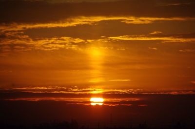 Sun shining through clouds