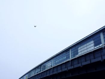 Low angle view of modern building against clear sky