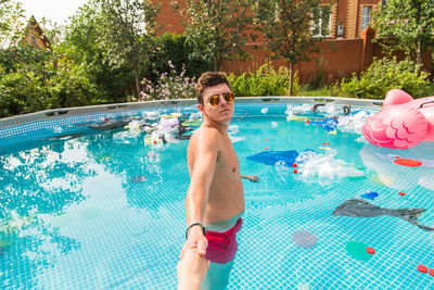 Woman swimming in pool