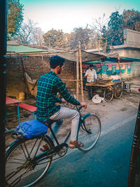 Bicycles on bicycle against trees