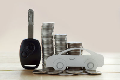 Close-up of coins on table