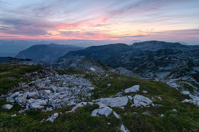 Scenic view of mountains against sky during sunset